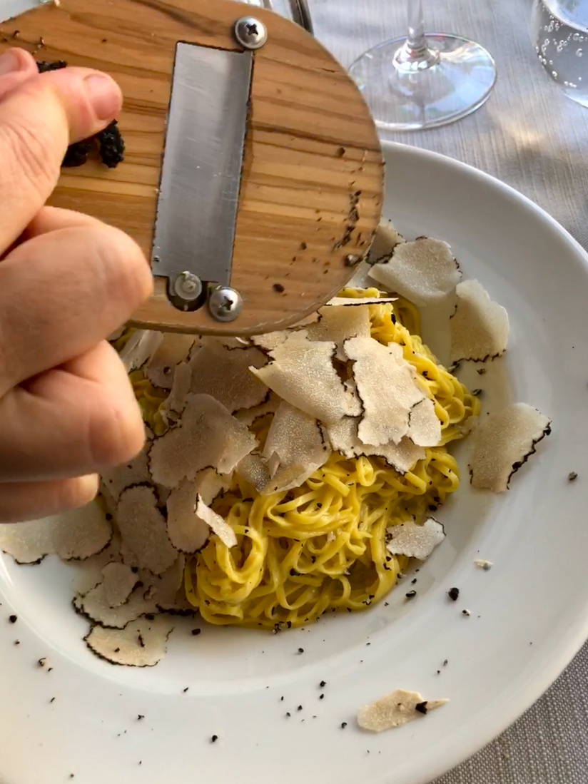 Grating Black Truffle on Pasta